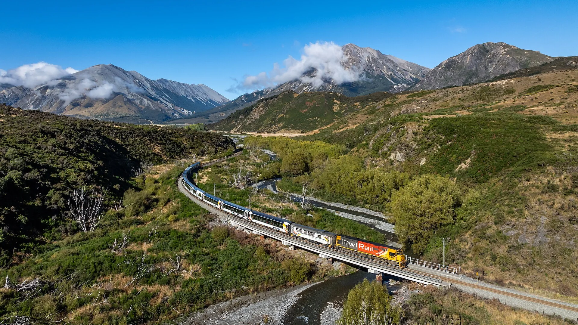 The TranzAlpine crossing a bridge near Arthur’s Pass in New Zealand’s Southern Alps